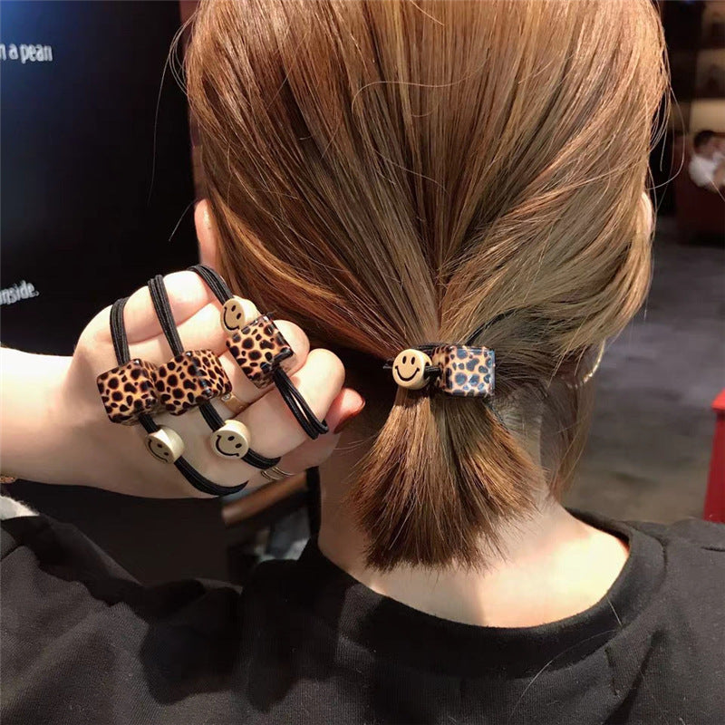 Smiley Face Hair Tie with Leopard Print Acrylic Cube