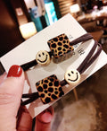 Smiley Face Hair Tie with Leopard Print Acrylic Cube