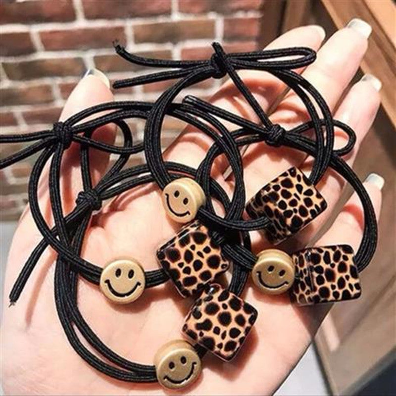 Smiley Face Hair Tie with Leopard Print Acrylic Cube
